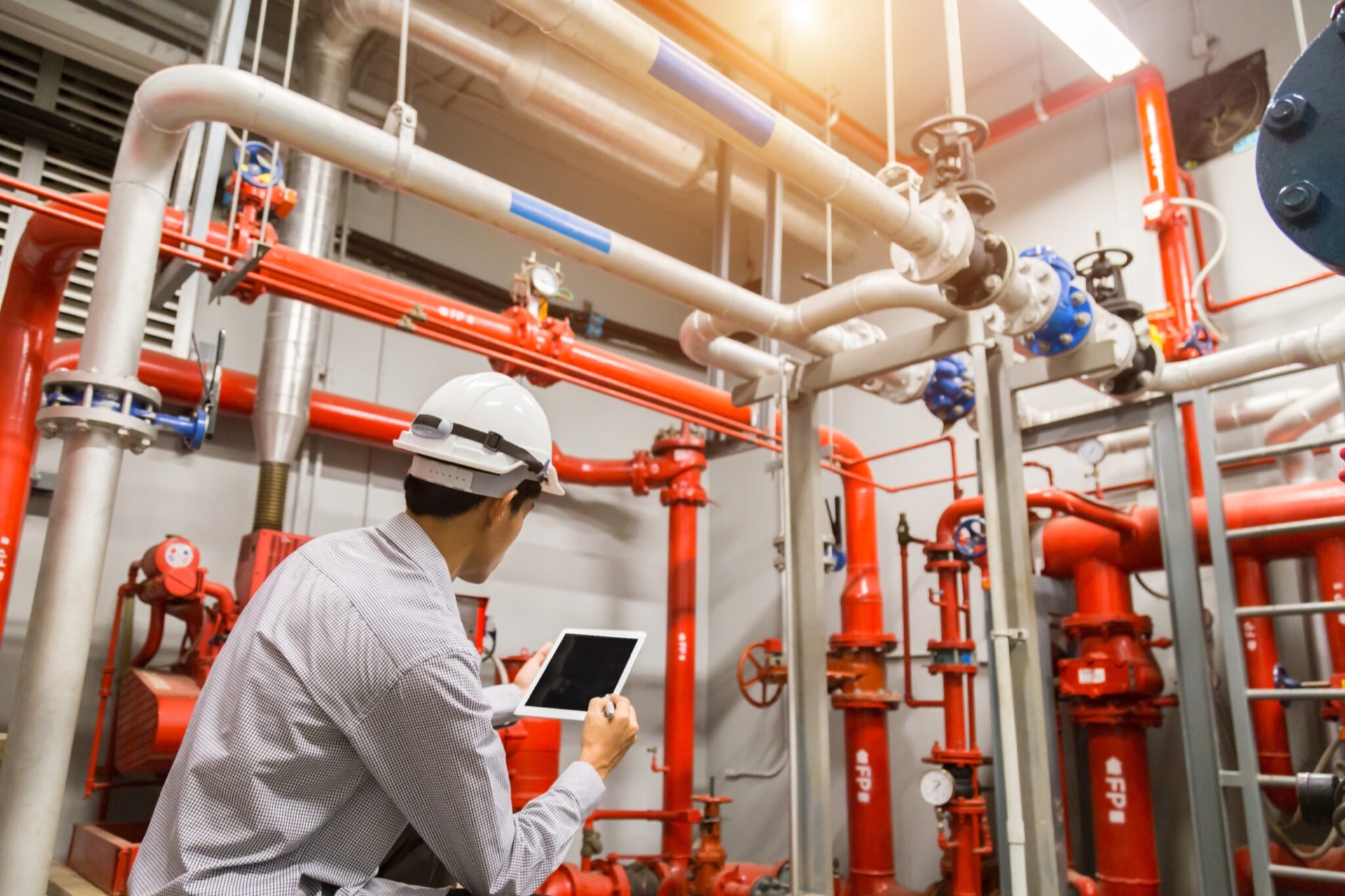 Louis Fire & Safety engineer inspecting a fire pump room in Abu Dhabi